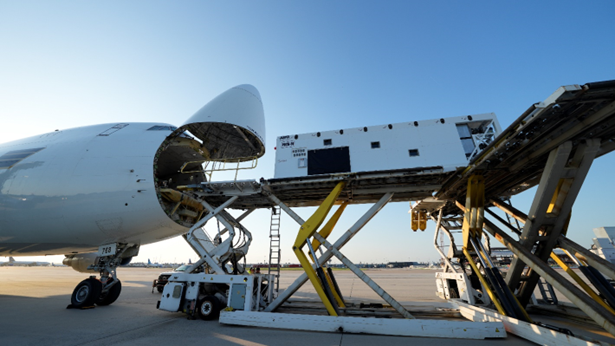Loading the PBCU on a Boeing 747 at Dulles International Airport