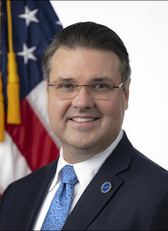 Portrait of Matthew Van Patton with American Flag