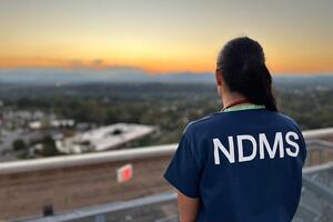 NDMS Worker Looking into sunset